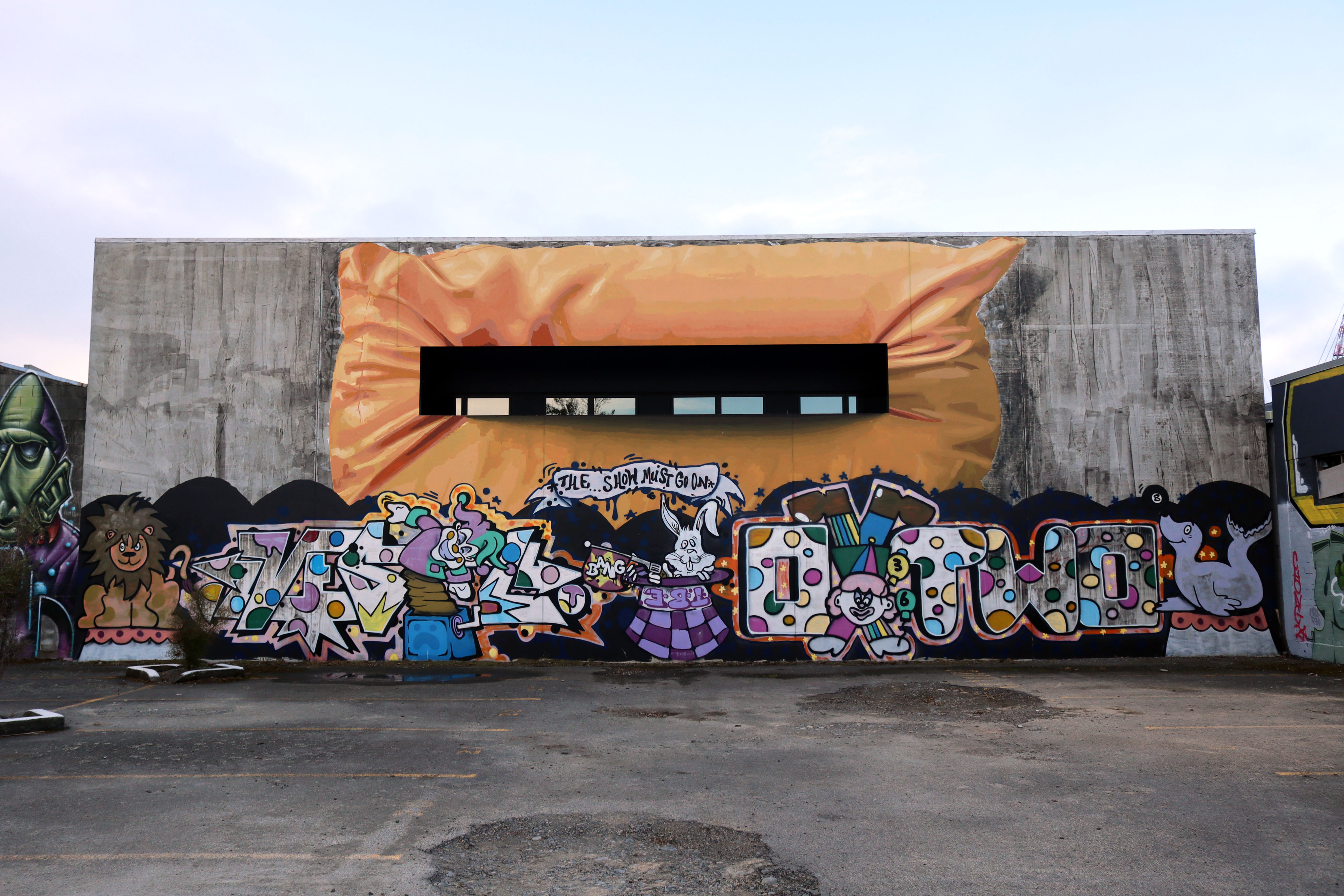 Some of the boundless wrinkles caused by the weight of a brick resting on a yellow pillow by Ampparito | Street Art NSW