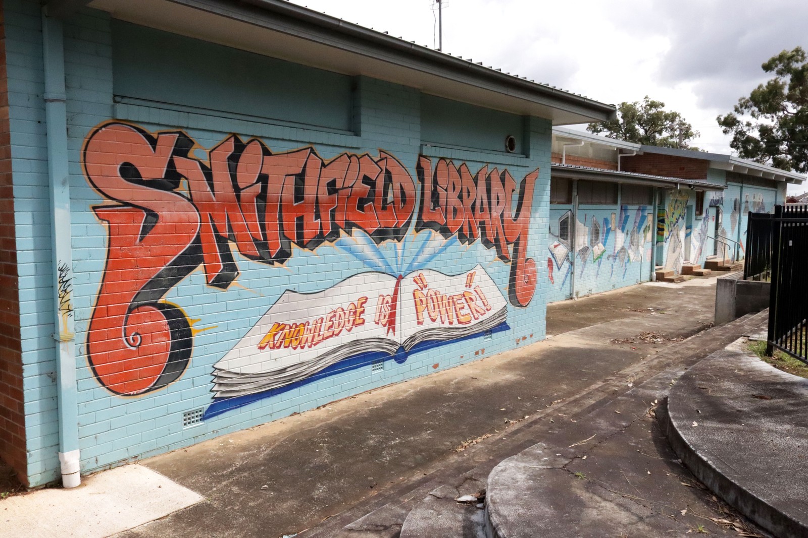 Knowledge Is Power by Ian Ballesteros | Street Art NSW