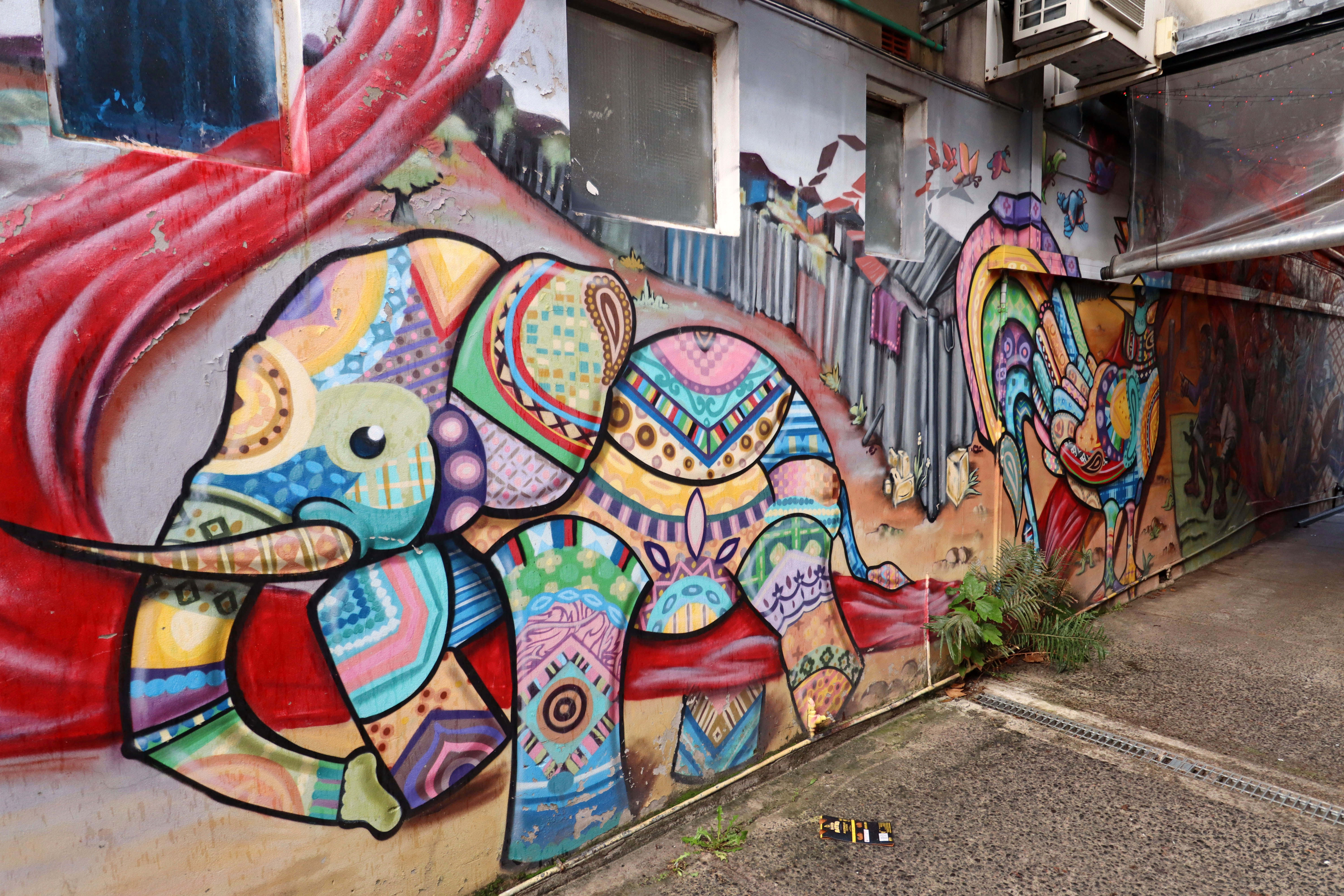 Fair Trade Mural by Krimsone | Street Art NSW