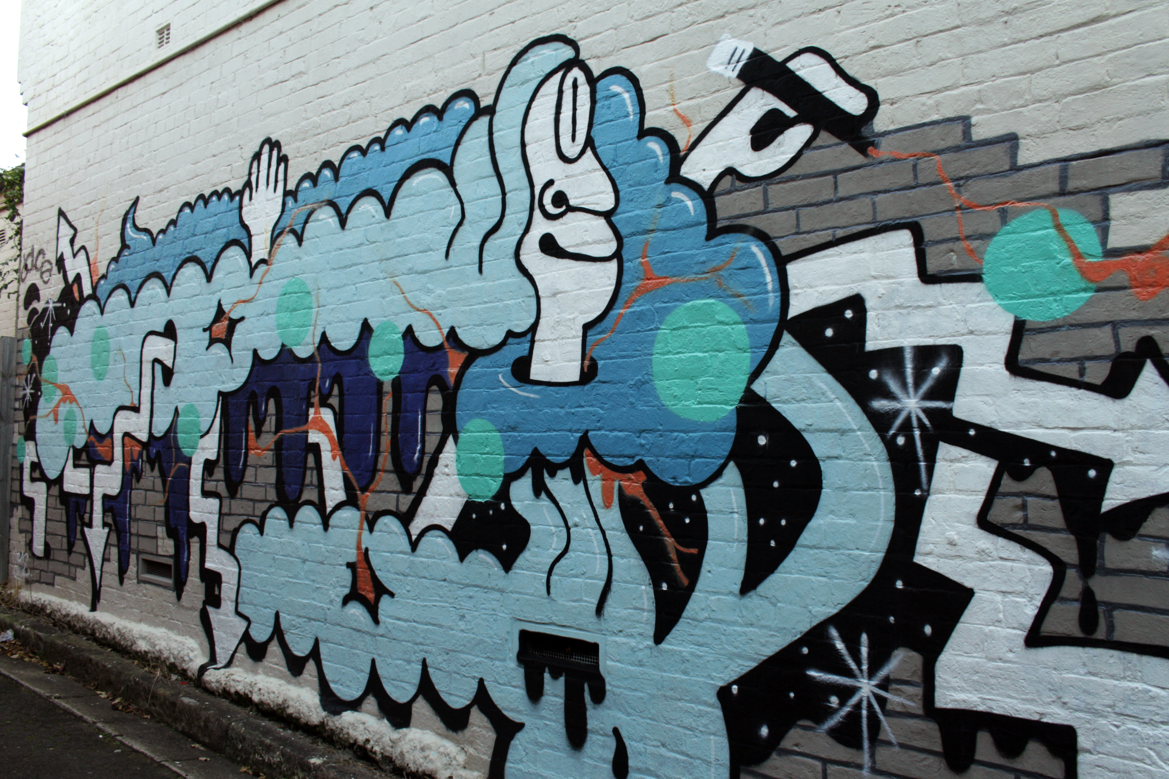 Blue Bubble Boogie Man Doing the Magic Pen Dance by Remy Roberts | Street Art NSW