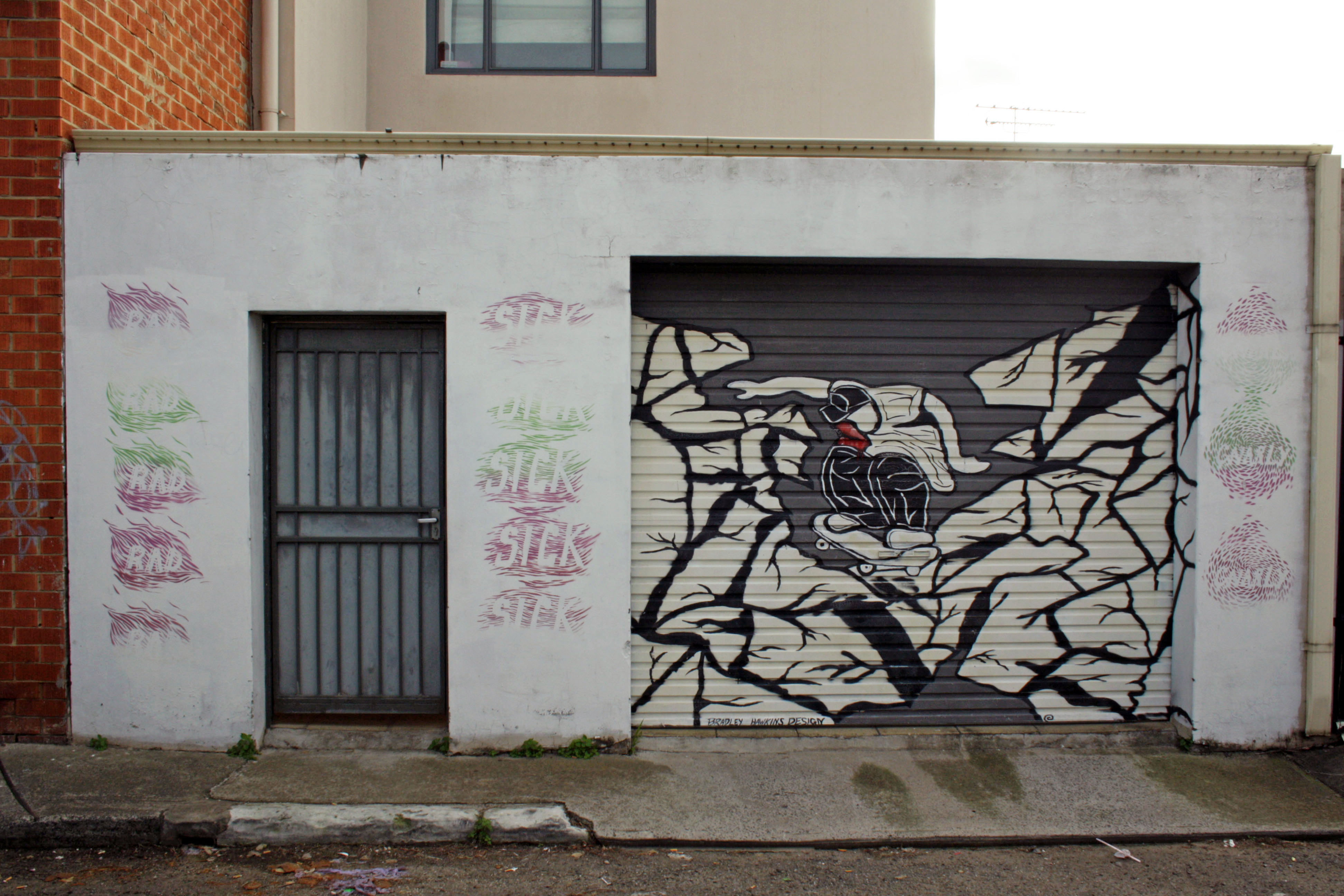 Breaking Down the Walls by Bradley Hawkins Design | Street Art NSW