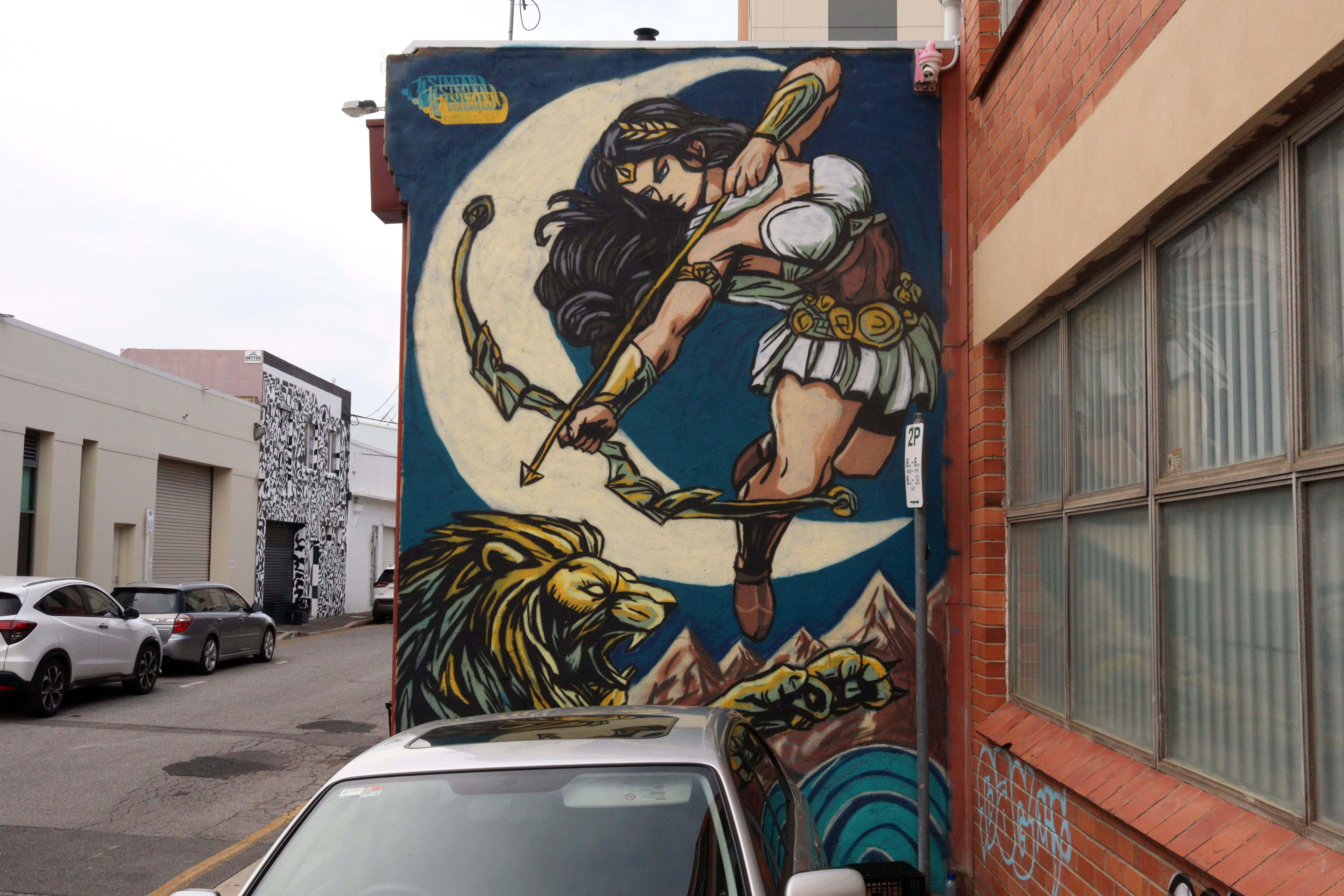 The Lion and Artemis the Huntress by Simeon Jones | Street Art NSW