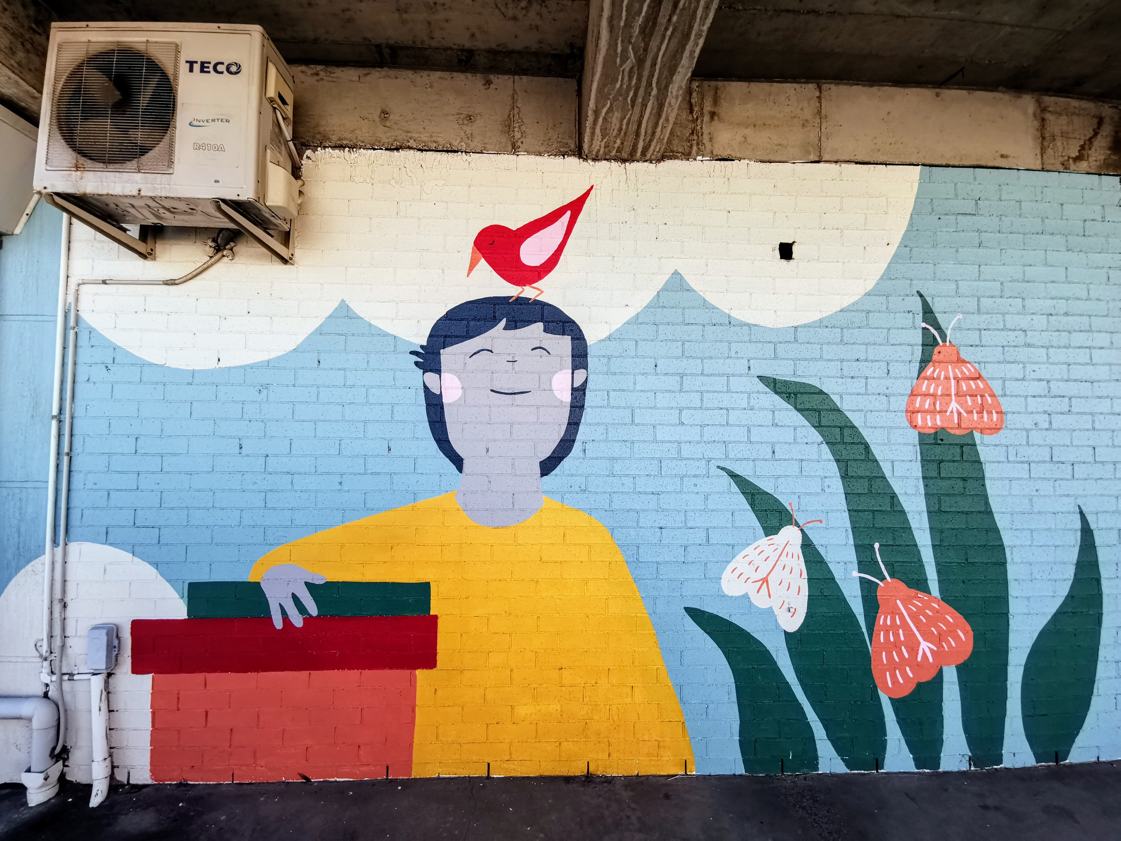 Lost in Books by Kim Siew | Street Art NSW