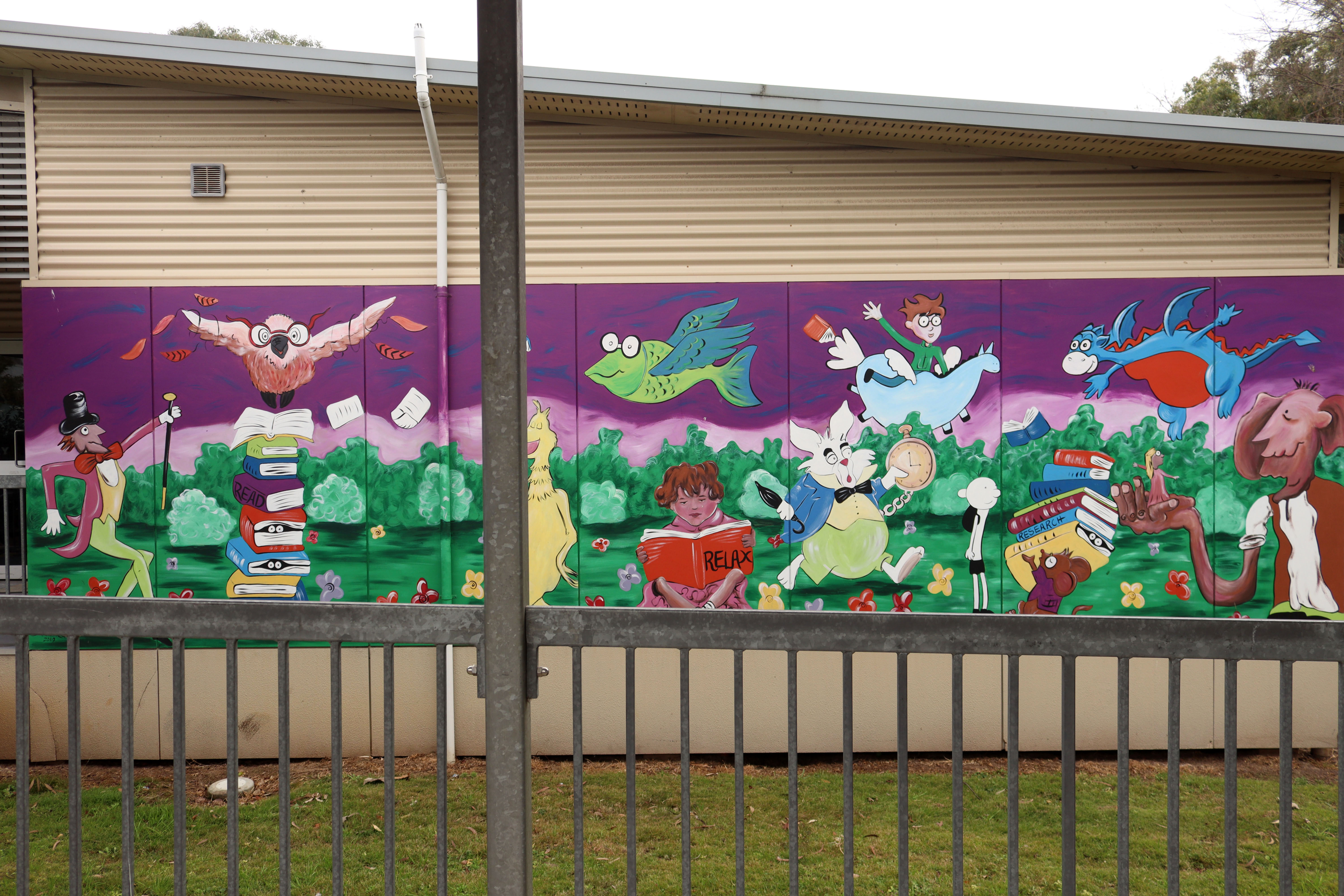 Library Wall by Danielle Rawnsley-Gallistan | Street Art NSW