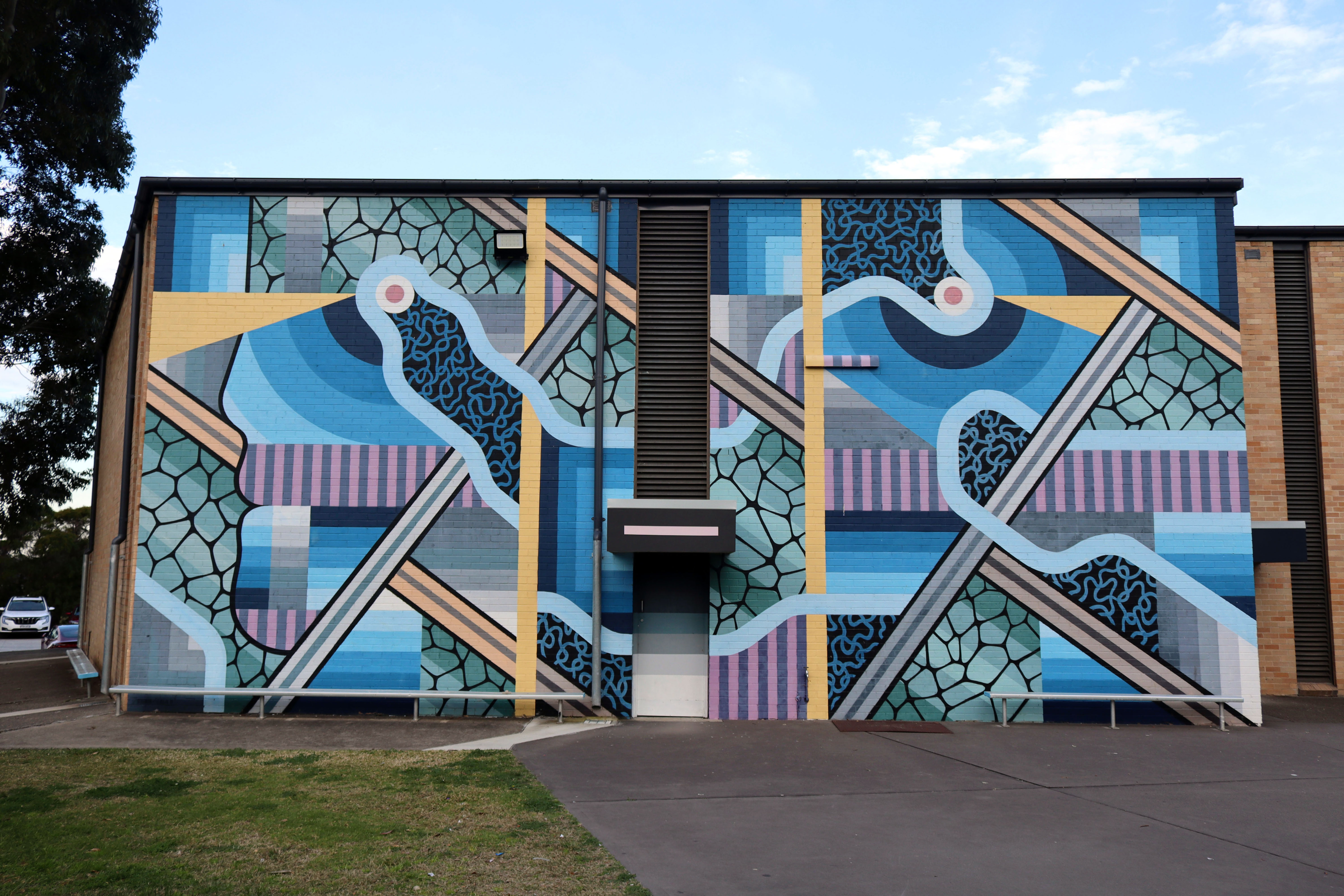 Doonside Technology High School Mural by Brad Eastman | Street Art NSW