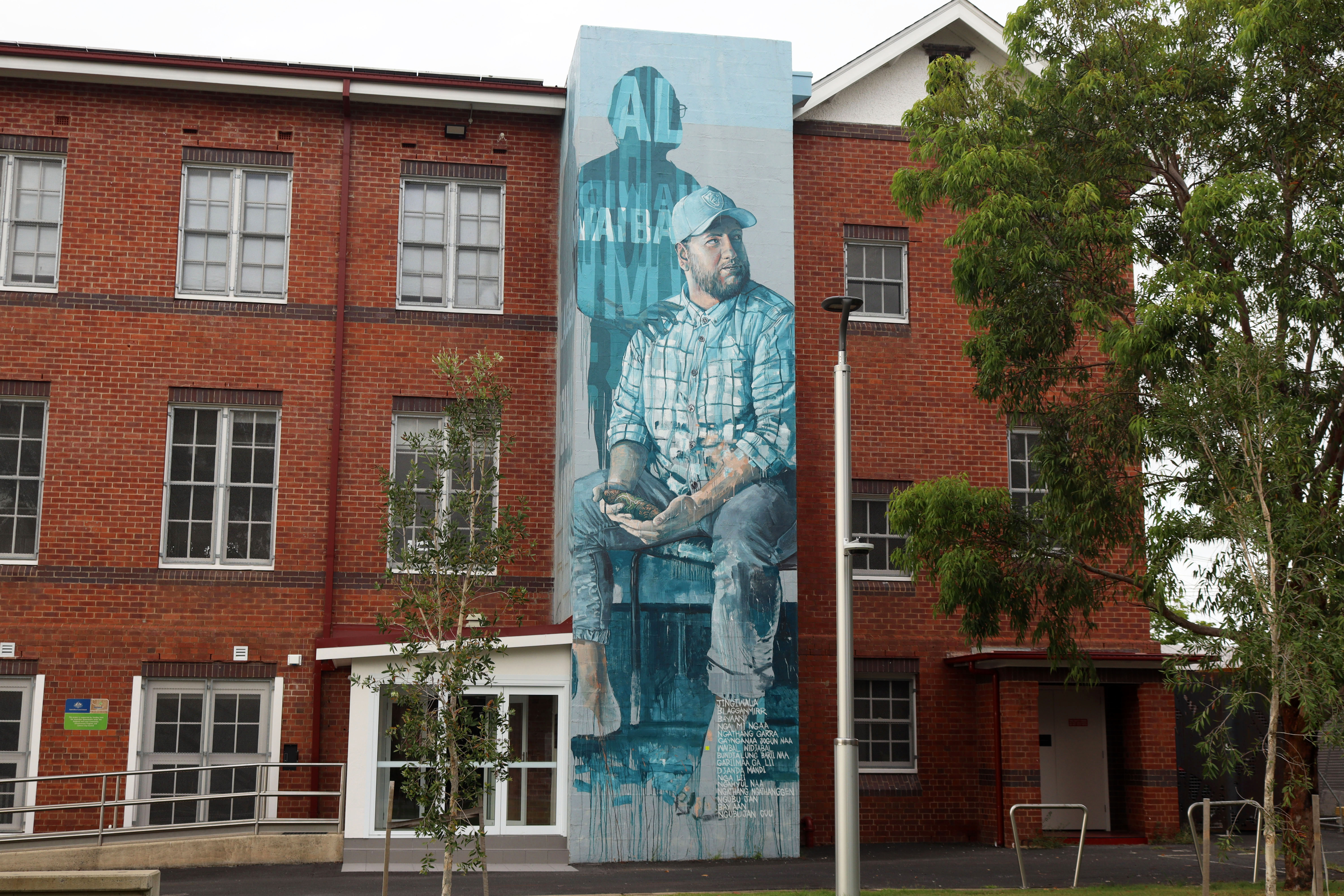 Portrait of Aunty Irene and Sheldon Junior by Fintan Magee | Street Art NSW
