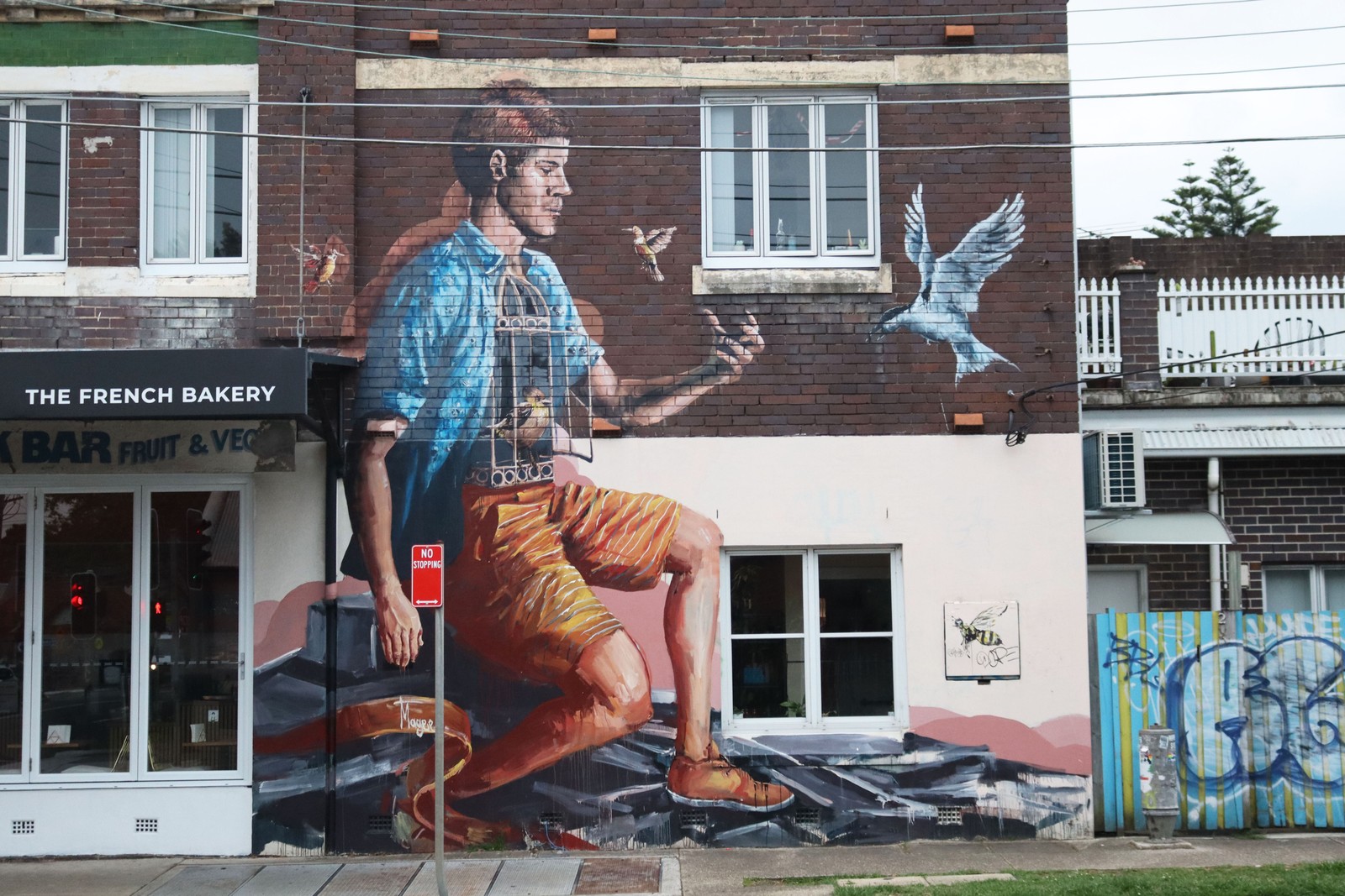 The Therapist/The Watcher by Fintan Magee | Street Art NSW