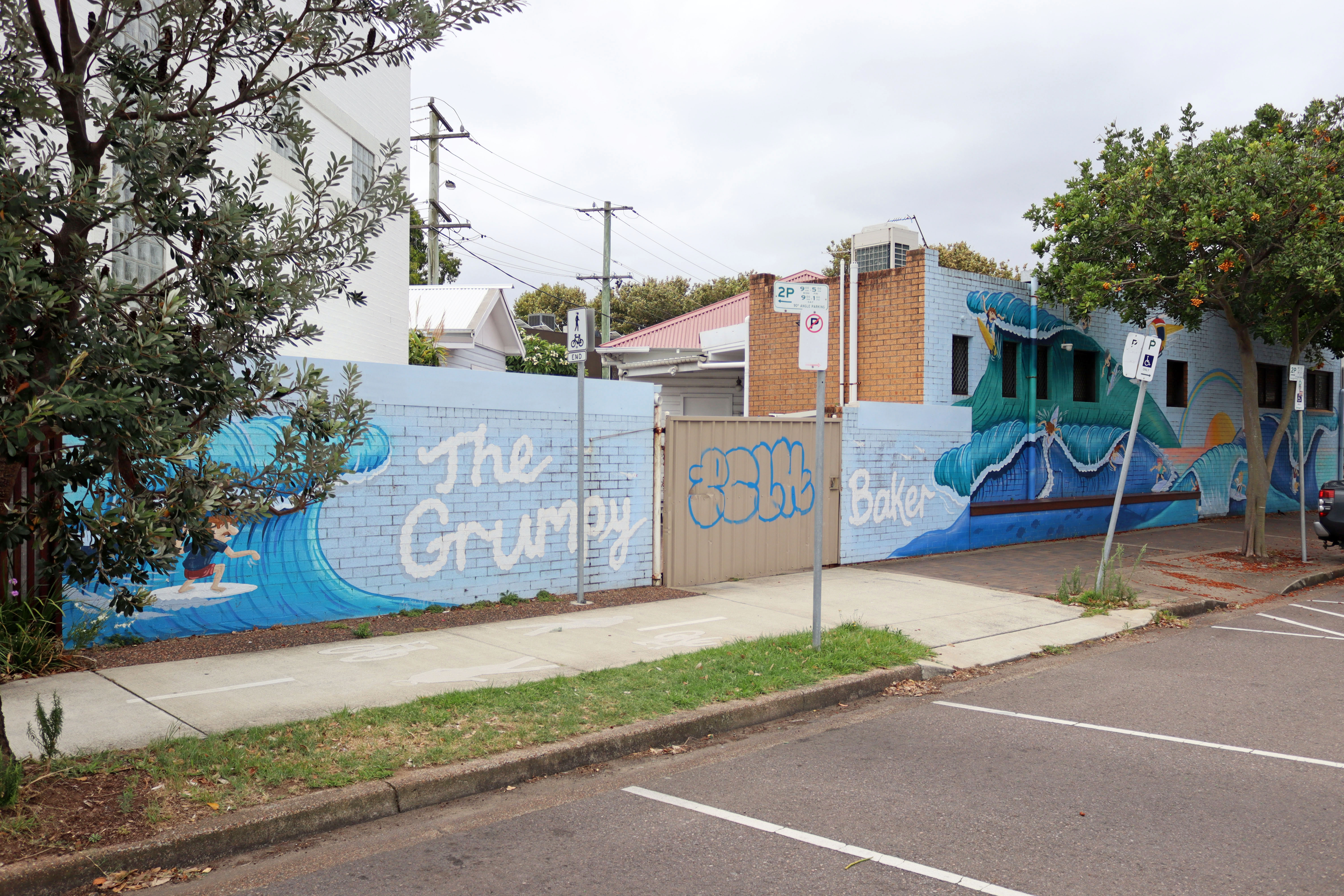 The Grumpy Baker Mural by Mitch Revs | Street Art NSW
