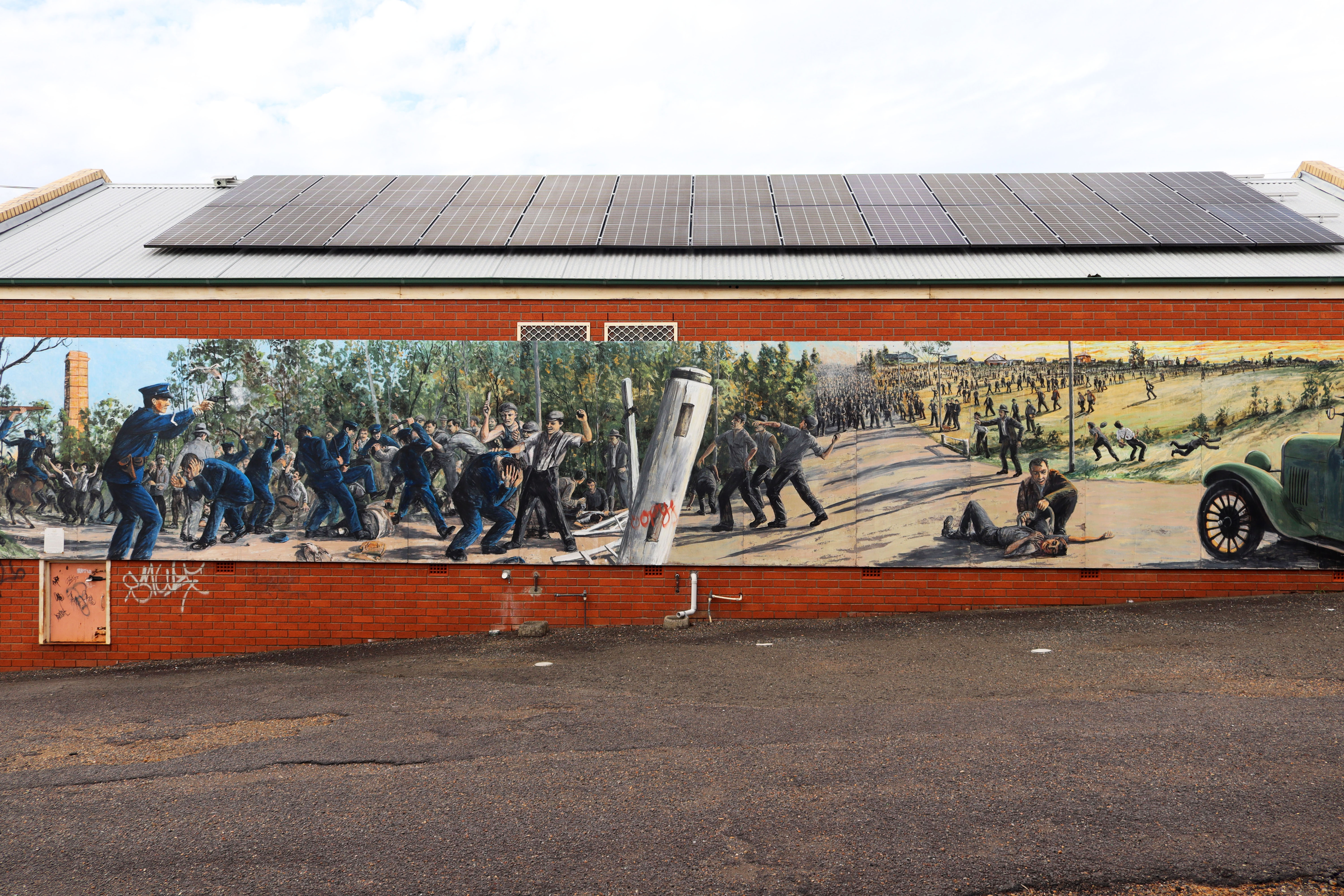 Rothbury Riot Mural by Chris Fussell | Street Art NSW