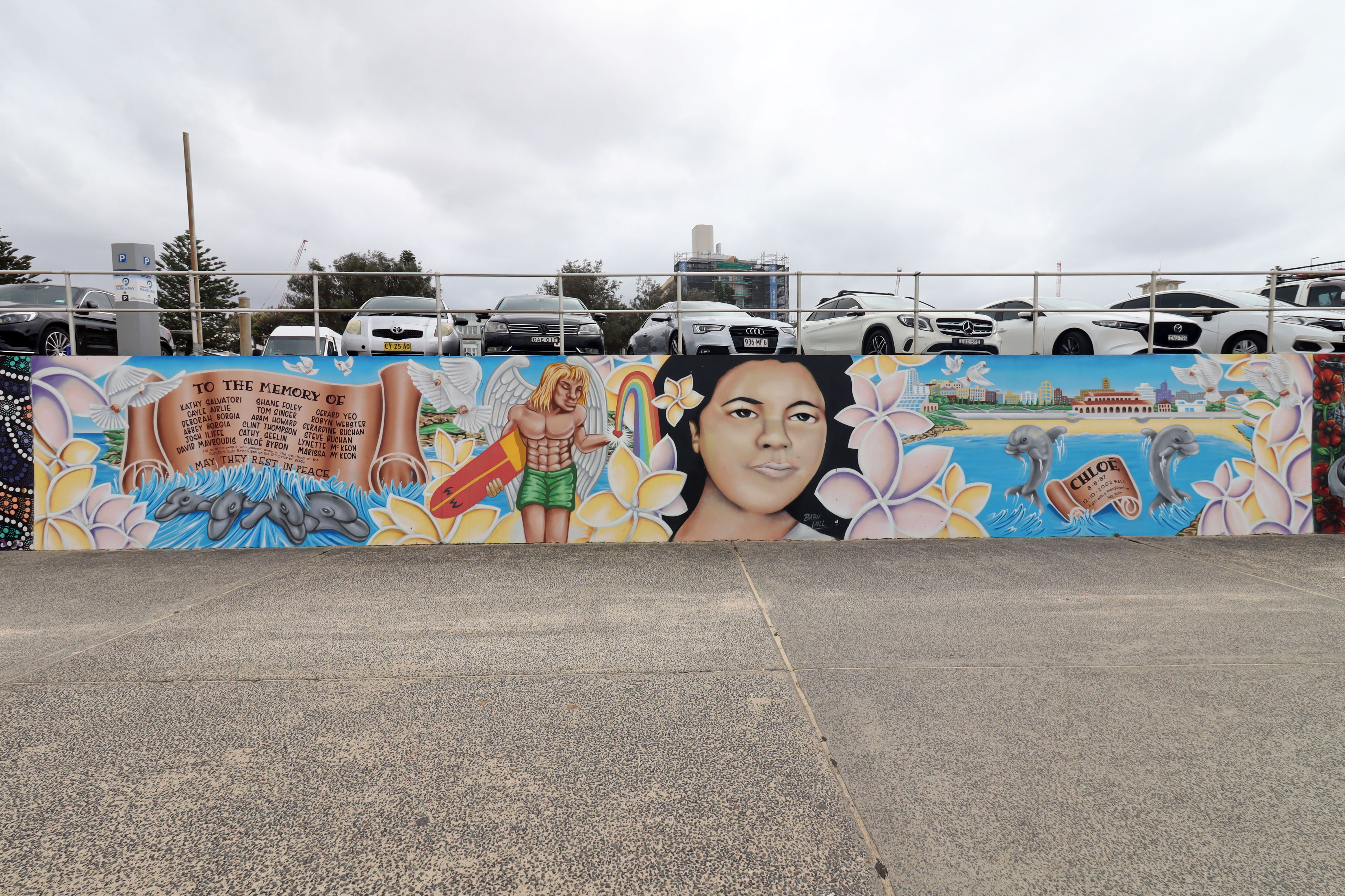 Bali Memorial - Girl with the Frangipani in Her Hair by Droogie | Street Art NSW